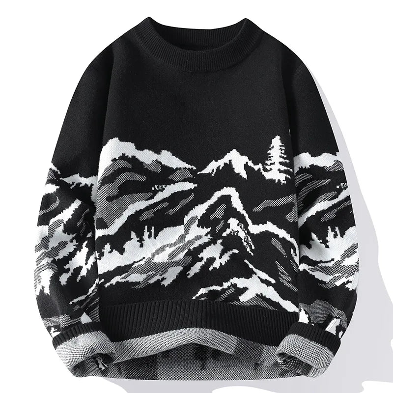 Black sweater with mountain pattern on a white background
