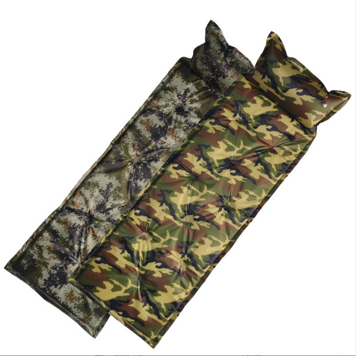 Camouflage-patterned inflatable sleeping pad with two pillows on a white background