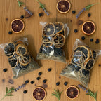 Three bags of simmer pot mix with orange slices, lavender and blueberries.