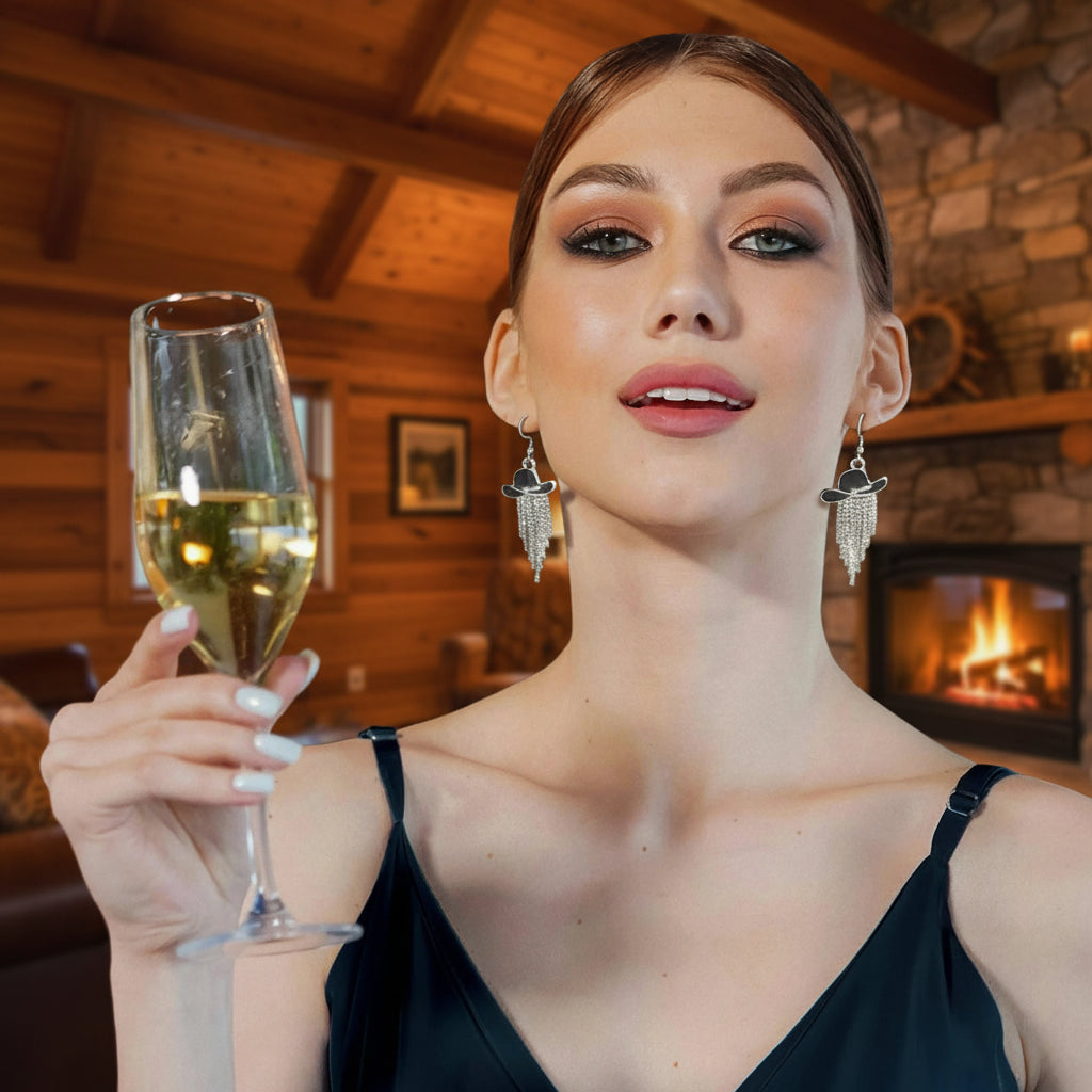 Woman holding a glass of champagne with a blurred background