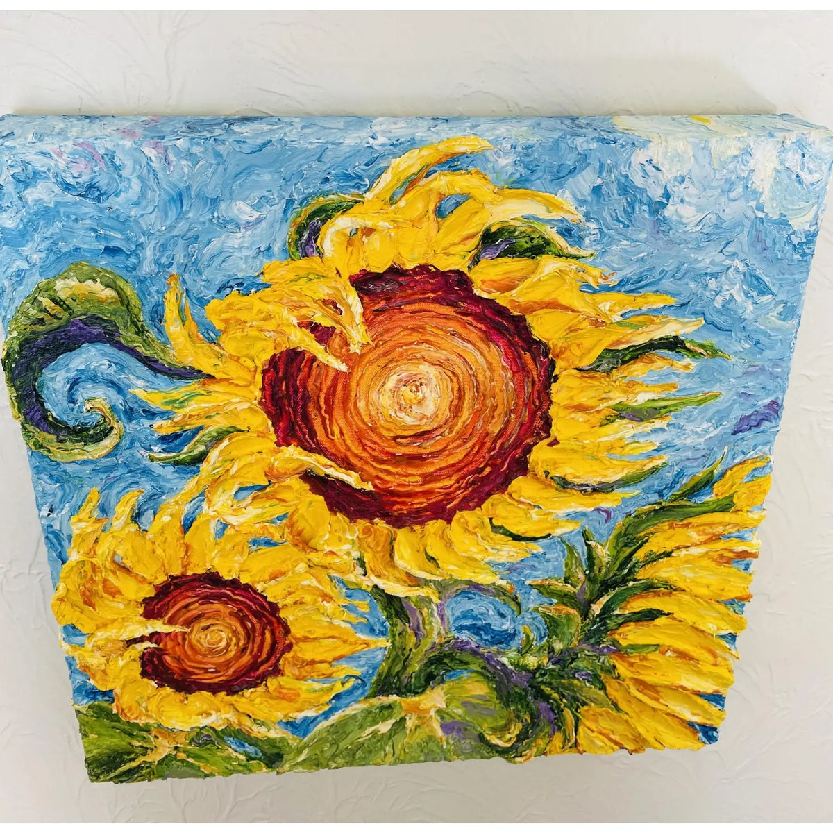 Side perspective of Sunflowers painting showing raised palette-knife texture