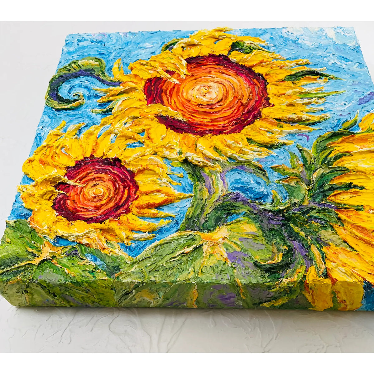 Angled view of Sunflowers original oil painting showing its deep painted canvas edge