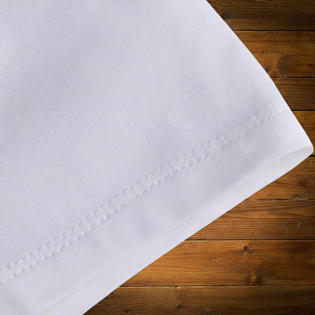 White Tee Detail on Wood Background